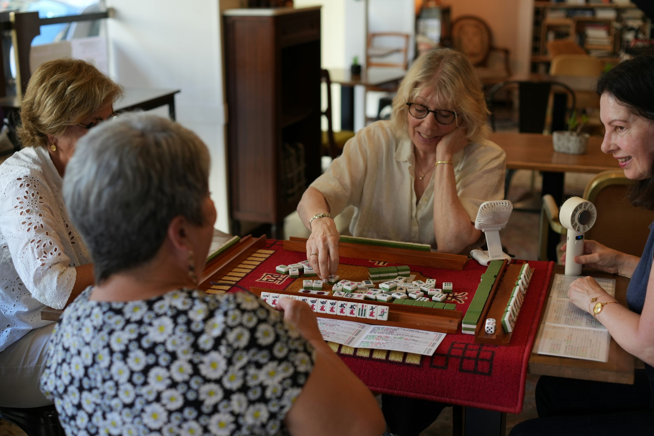 seniors playing a boardgame